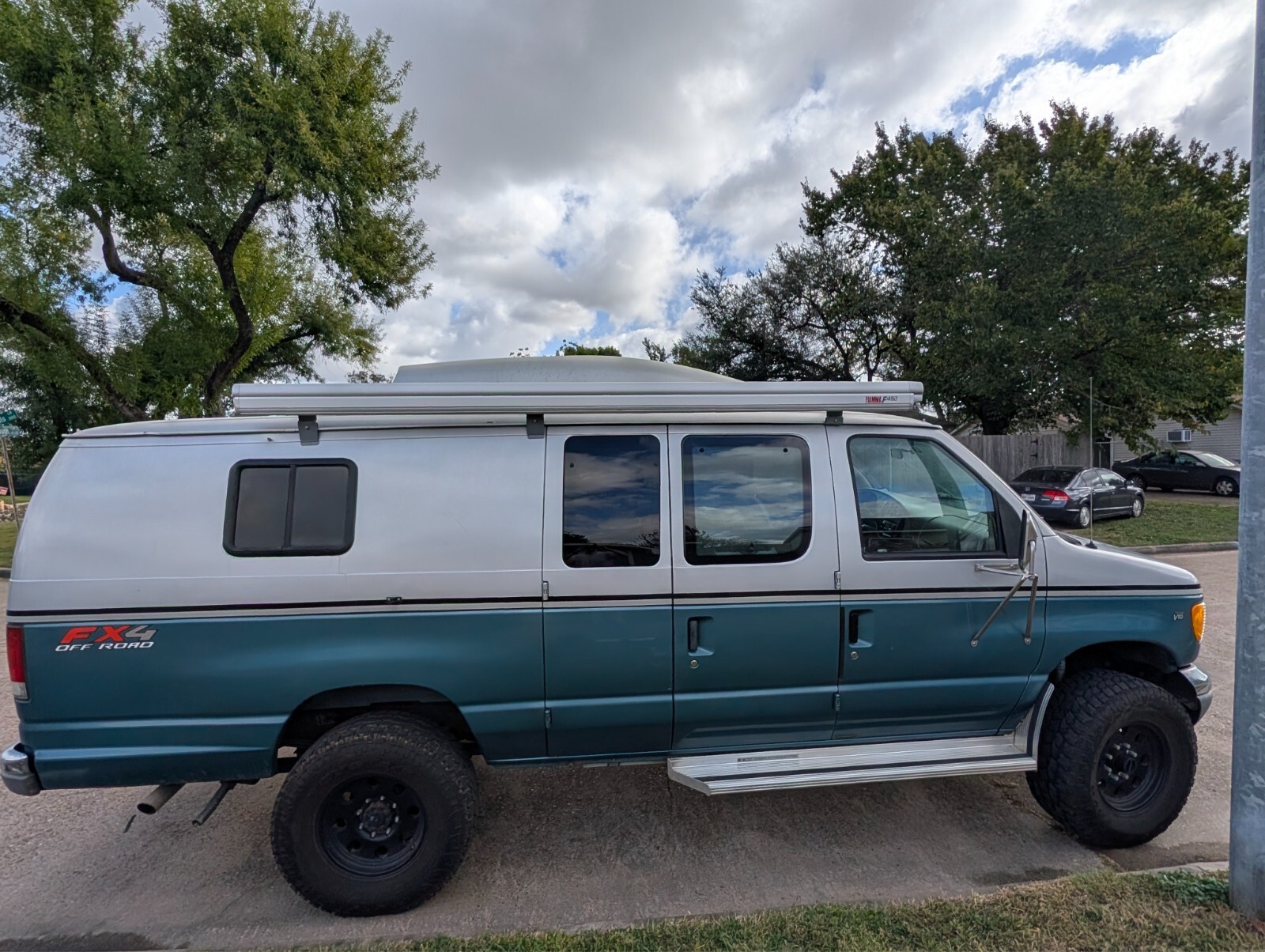 1998 Ford V10 Class B Camper Van 4X4 Lifted RV inside outside kitchen generator