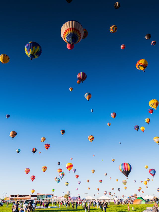Let's go RV Camping to The Albuquerque International Balloon Fiesta Hot air balloons fill the sky at the iconic Albuquerque International Balloon Fiesta